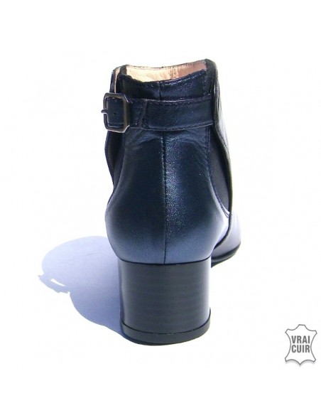 Black and iridescent blue boots