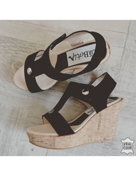 Women&#39;s black leather wedge sandals